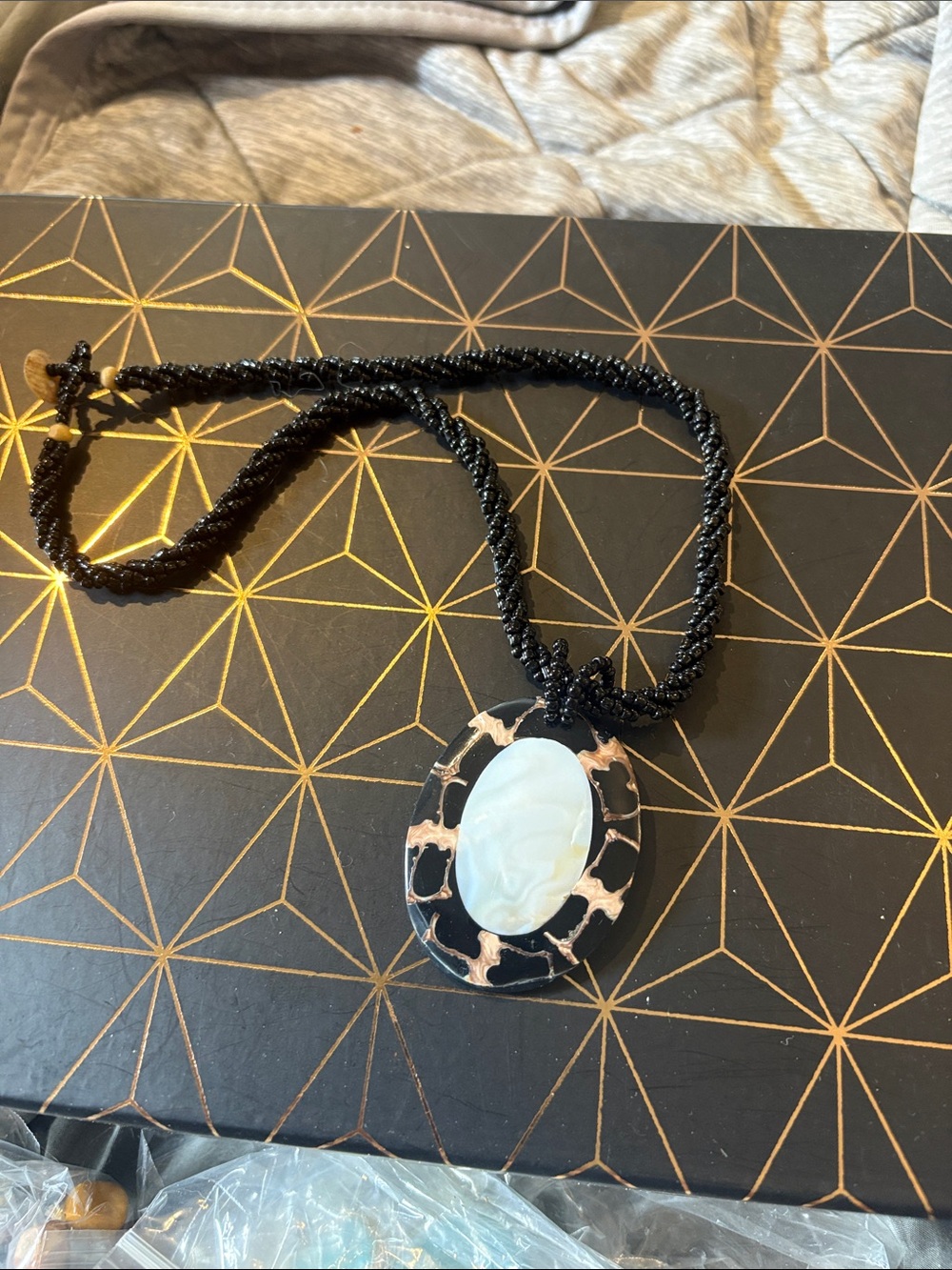 Black Rope Necklace with White Cameo Pendant